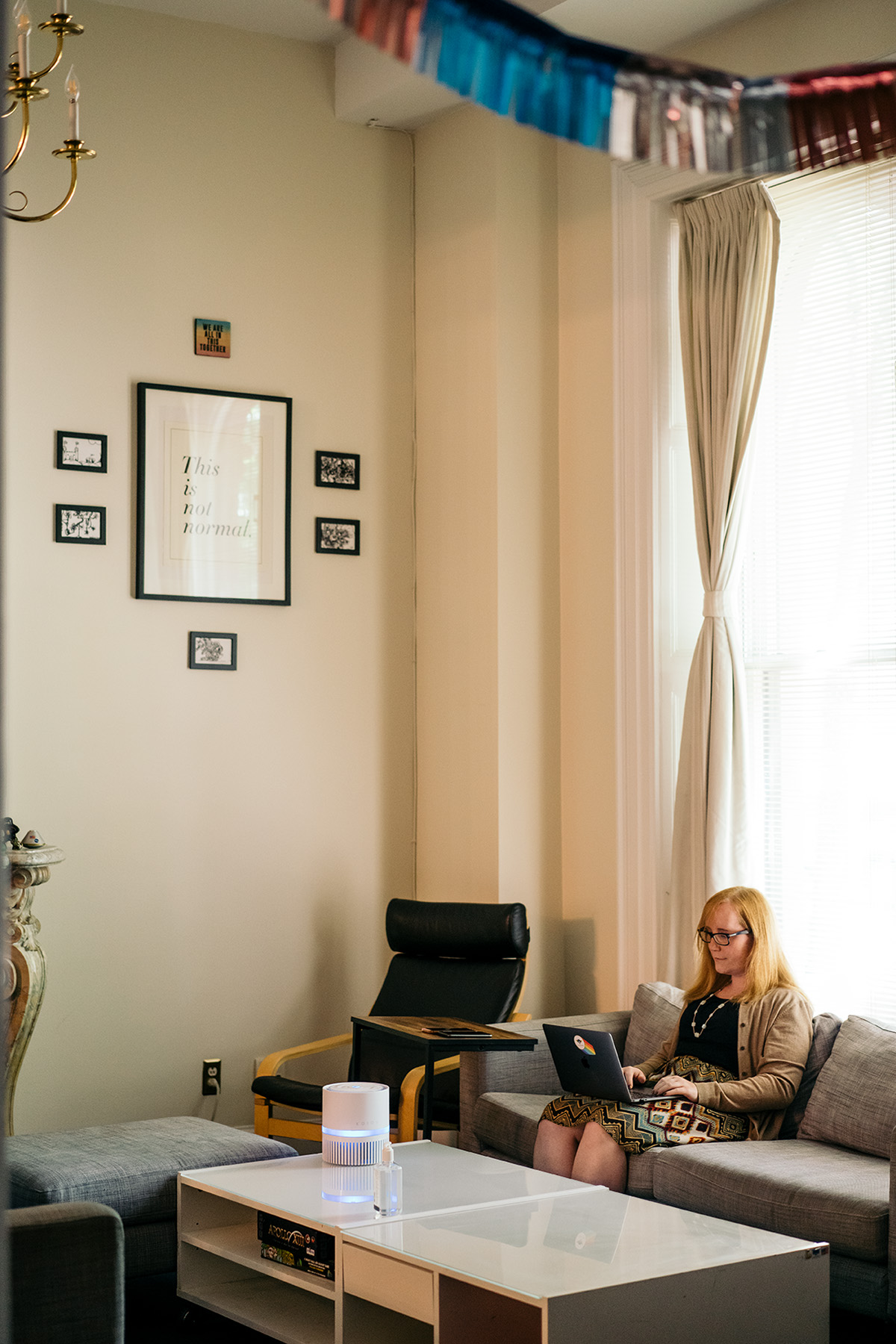 Amy Paris is photographed working in her office.