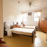 A room is seen in a temporary domestic violence shelter.