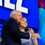 Hope Walz embraces her father, Minnesota Gov. Tim Walz on stage at the Democratic National Convention.