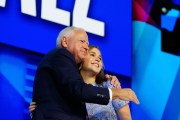 Hope Walz embraces her father, Minnesota Gov. Tim Walz on stage at the Democratic National Convention.