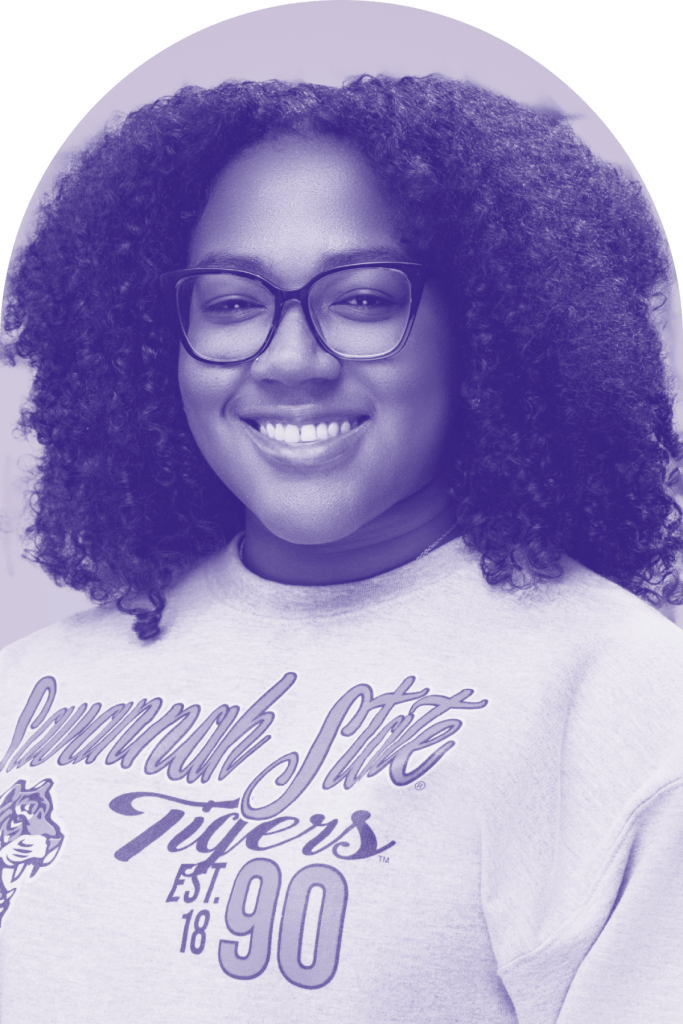 A purple headshot of 19th fellow Eden Turner.