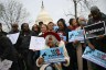 HIV advocates demonstrate to oppose federal HIV funding cuts in front of the Capitol.