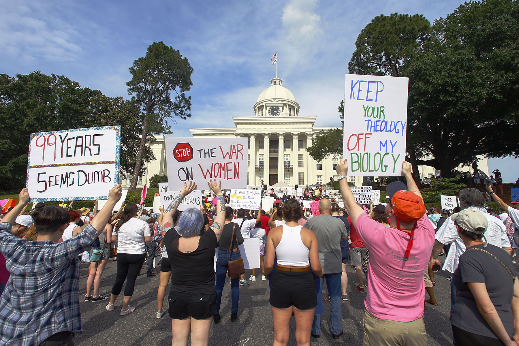 Protesters rally for abortion rights on the Alabama Capitol steps.