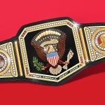 Illustration of A custom wrestling championship belt featuring the Great Seal of the United States in the center, flanked by a presidential portrait of Donald Trump and an image of the White House, with “MAKE AMERICA GREAT AGAIN” engraved at the bottom.