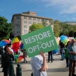 People protesting outside the Supreme Court for a case about schools and religion