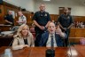 Former film producer Harvey Weinstein gestures as he sits next to attorney Diana Fabi Samson as the jury deliberates at Manhattan Criminal Court