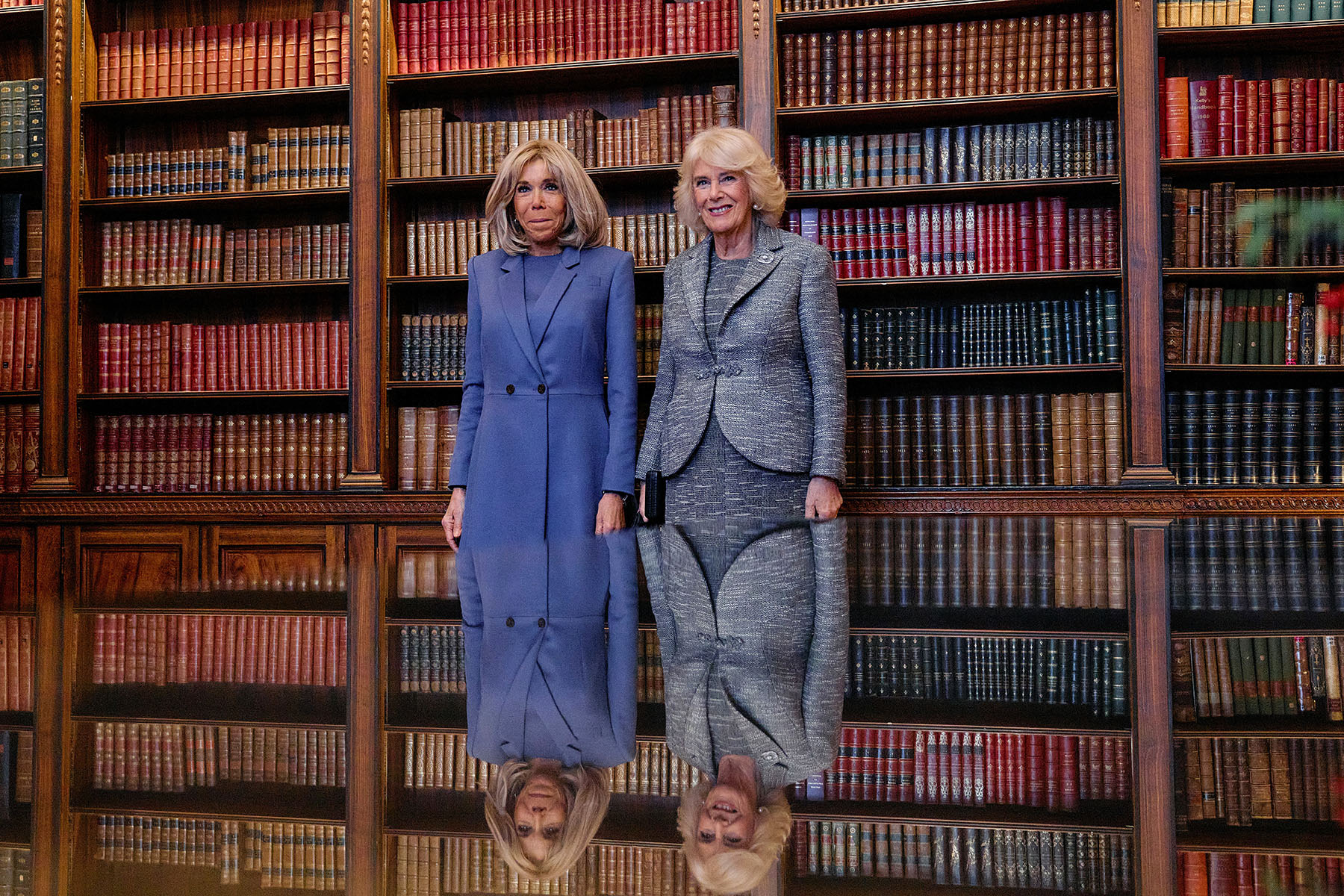France's first lady Brigitte Macron and Britain's Queen Camilla pose for a picture at the French Ambassador's Residence in London.