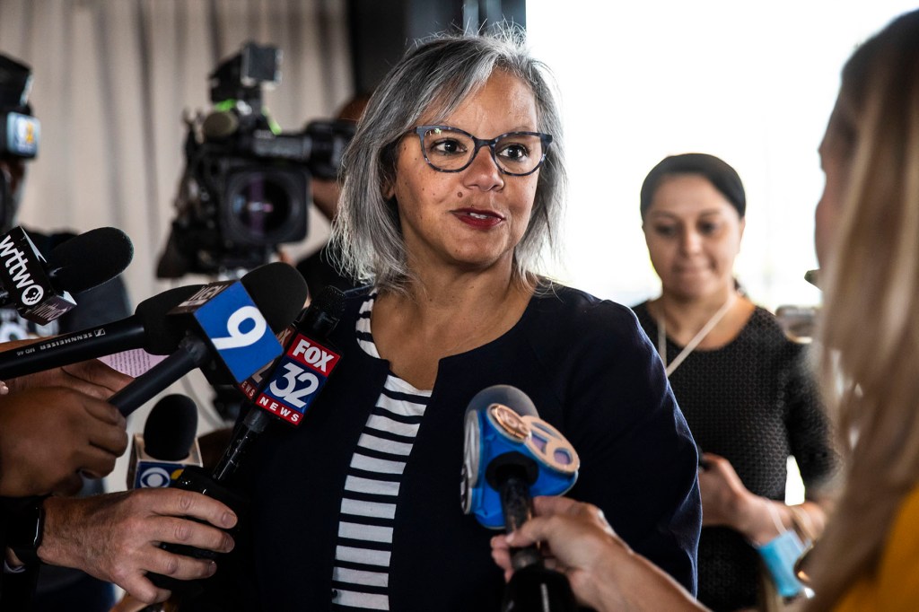 Rep. Robin Kelly speaks to reporters after a news conference in Chicago.
