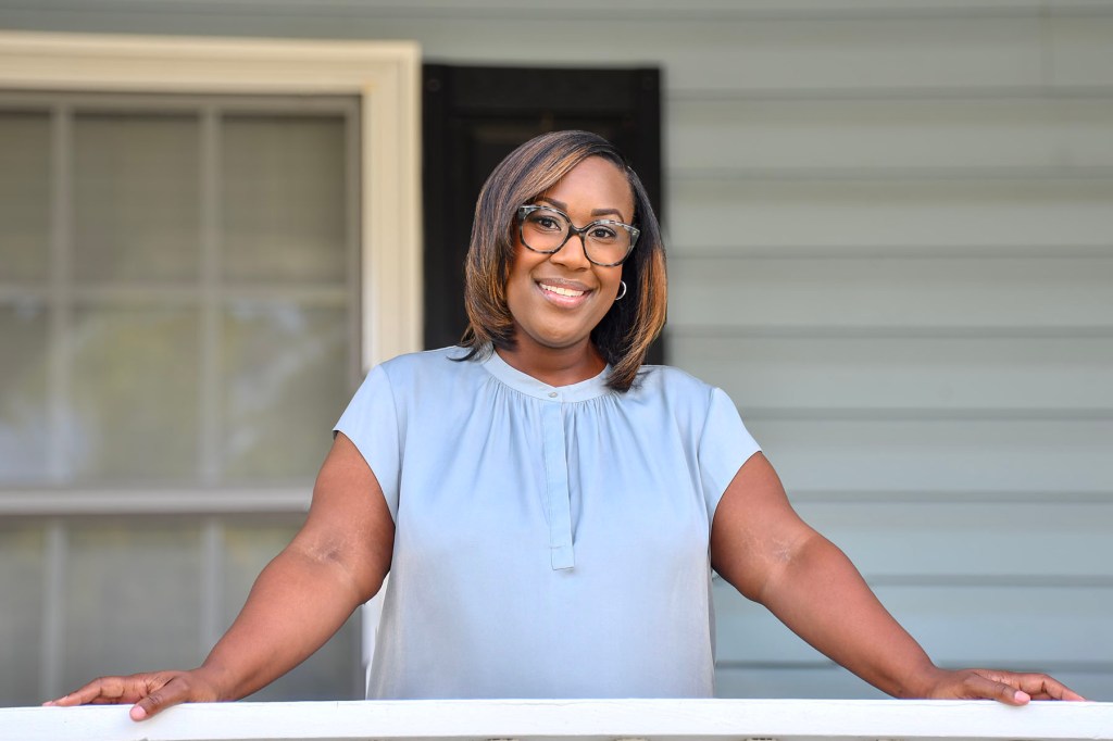 A smiling portrait of Kimberly Pope Adams.