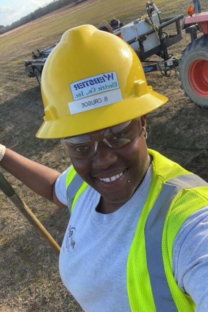 Selfie of a woman in a hard hat