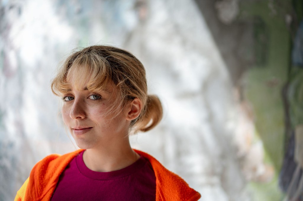 Kat Abughazaleh looks at the camera as she poses for a portrait.