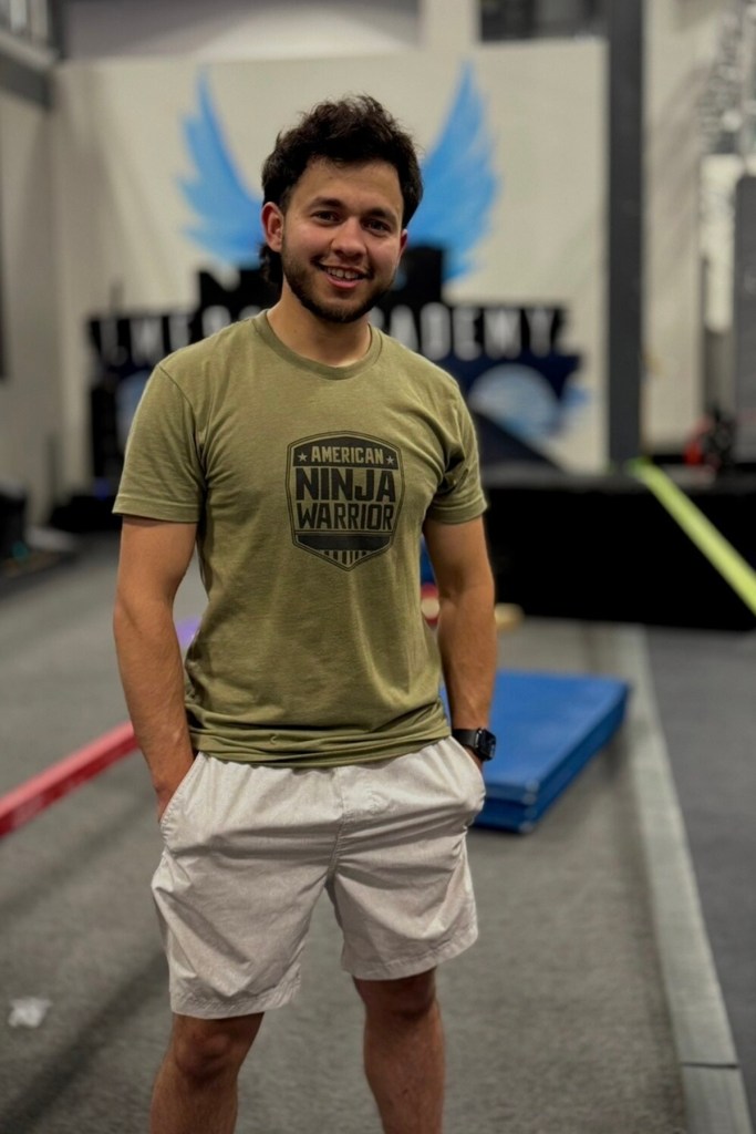 Portrait of Reeves in a gym.