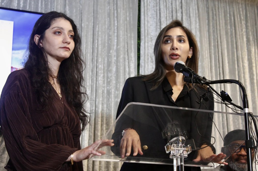 Ward Sakeik and her attorney, Maria Kari, speak at a press conference at the Wyndham Hotel in Irving, Texas.