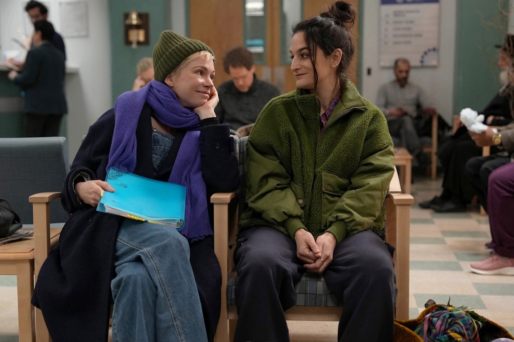 A scene from FX's "Dying for Sex," in which two characters smile at each other in the waiting room of a hospital.