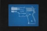 Blueprint of a firearm on black background.