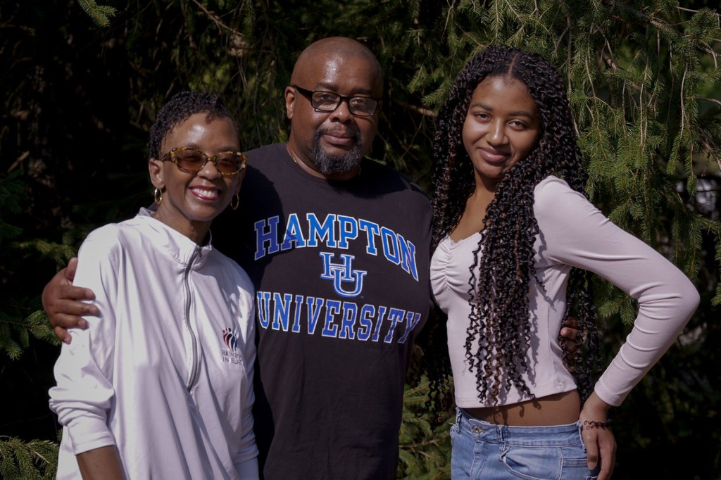 Milissa poses with her parents, Keisha and Sean
