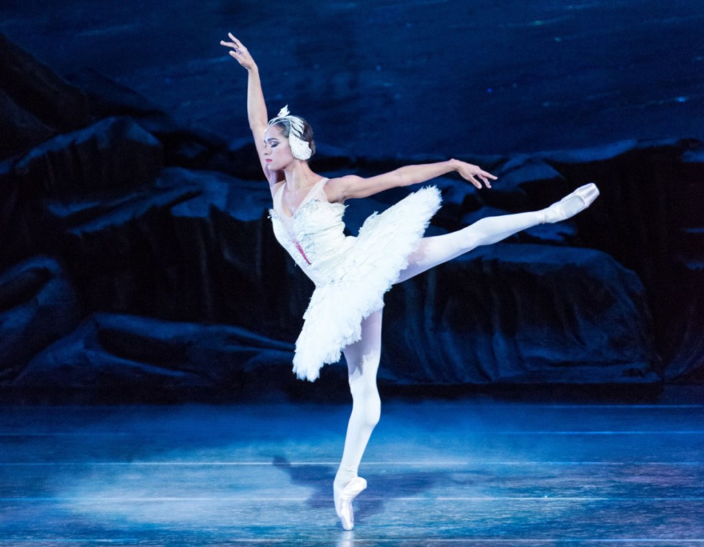 Misty Copeland dances on stage during her 2015 Swan Lake debut.