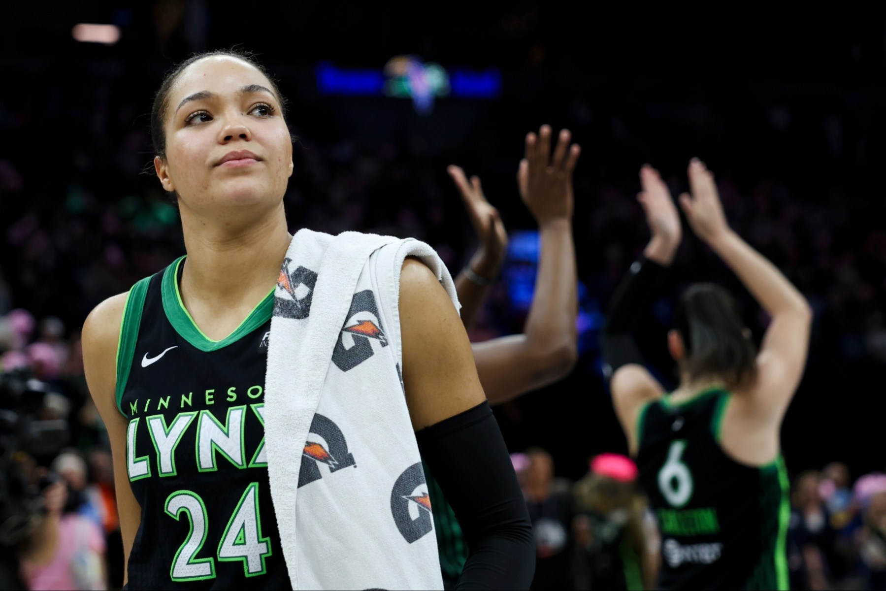 Napheesa Collier of the Minnesota Lynx reacts after winning a game.