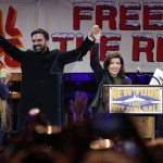 New York City mayoral candidate Zohran Mamdani holds hands with New York Governor Kathy Hochul on stage during a campaign rally at Forest Hills Stadium in the Queens borough of New York City.