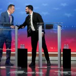 Former New York Gov. Andrew Cuomo greets Democratic nominee Zohran Mamdani before participating in a mayoral debate.