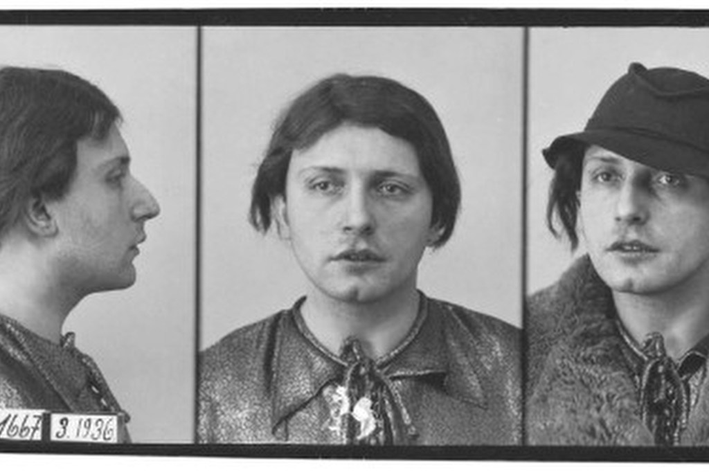 Black and white mugshots of a person dressed in feminine attire.