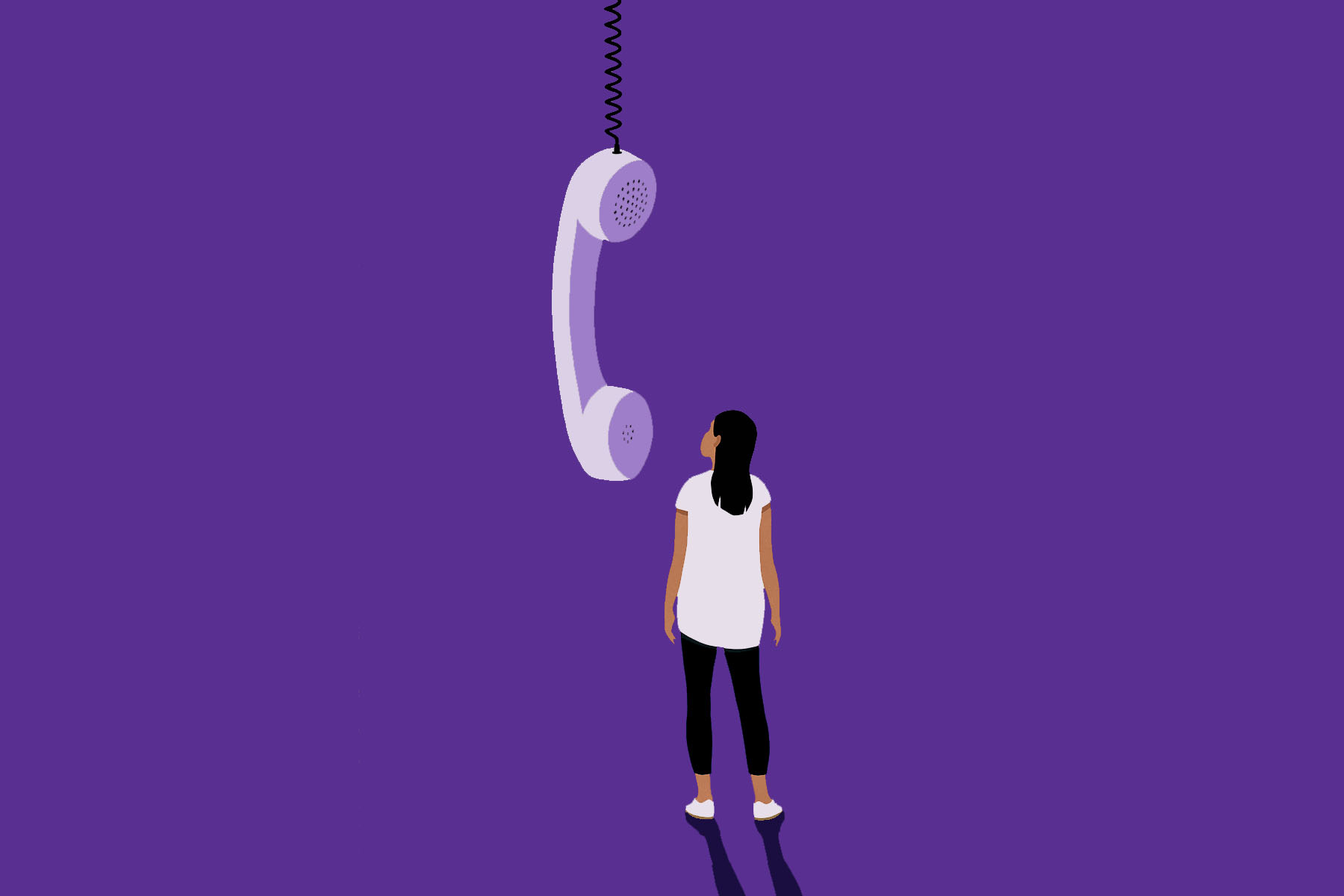 A woman stands on a purple background, looking up at a large telephone receiver hanging from a coiled cord above her.