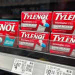 Tylenol packages in a pharmacy.