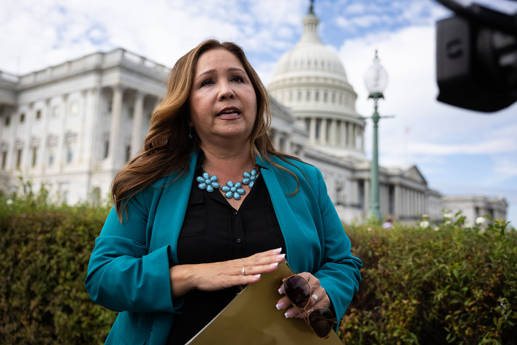 Representative-elect Adelita Grijalva speaks with reporters after a press conference outside the Capitol.