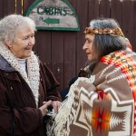 Sister Karen Kapell talks with Mildred A. Schuman, a tribal member of the Lac du Flambeau Band of Lake Superior Chippewa Indians at the ceremony.