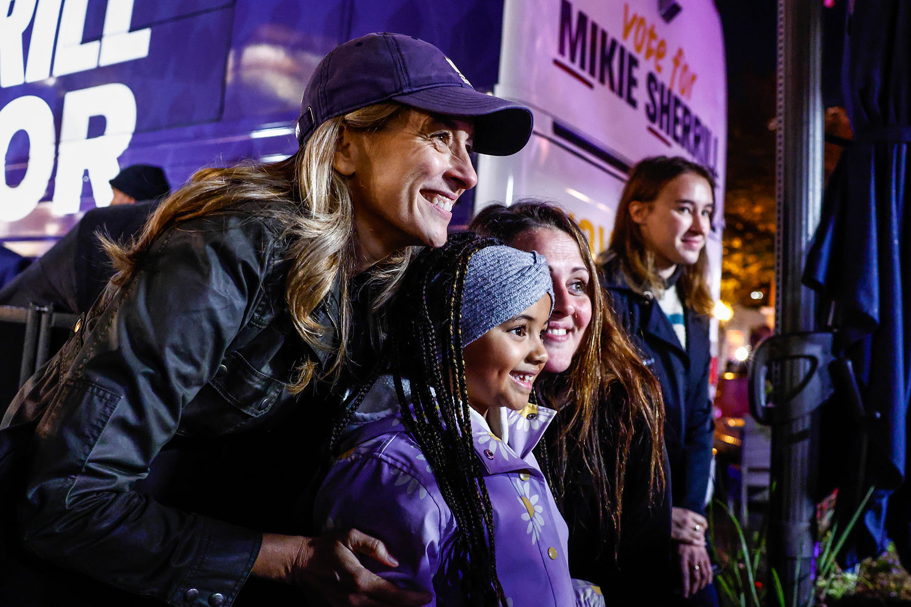 Rep. Mikie Sherrill poses with supporters during a campaign event.