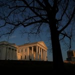 The Virginia State Capitol stands at sunset in Richmond, Virginia.