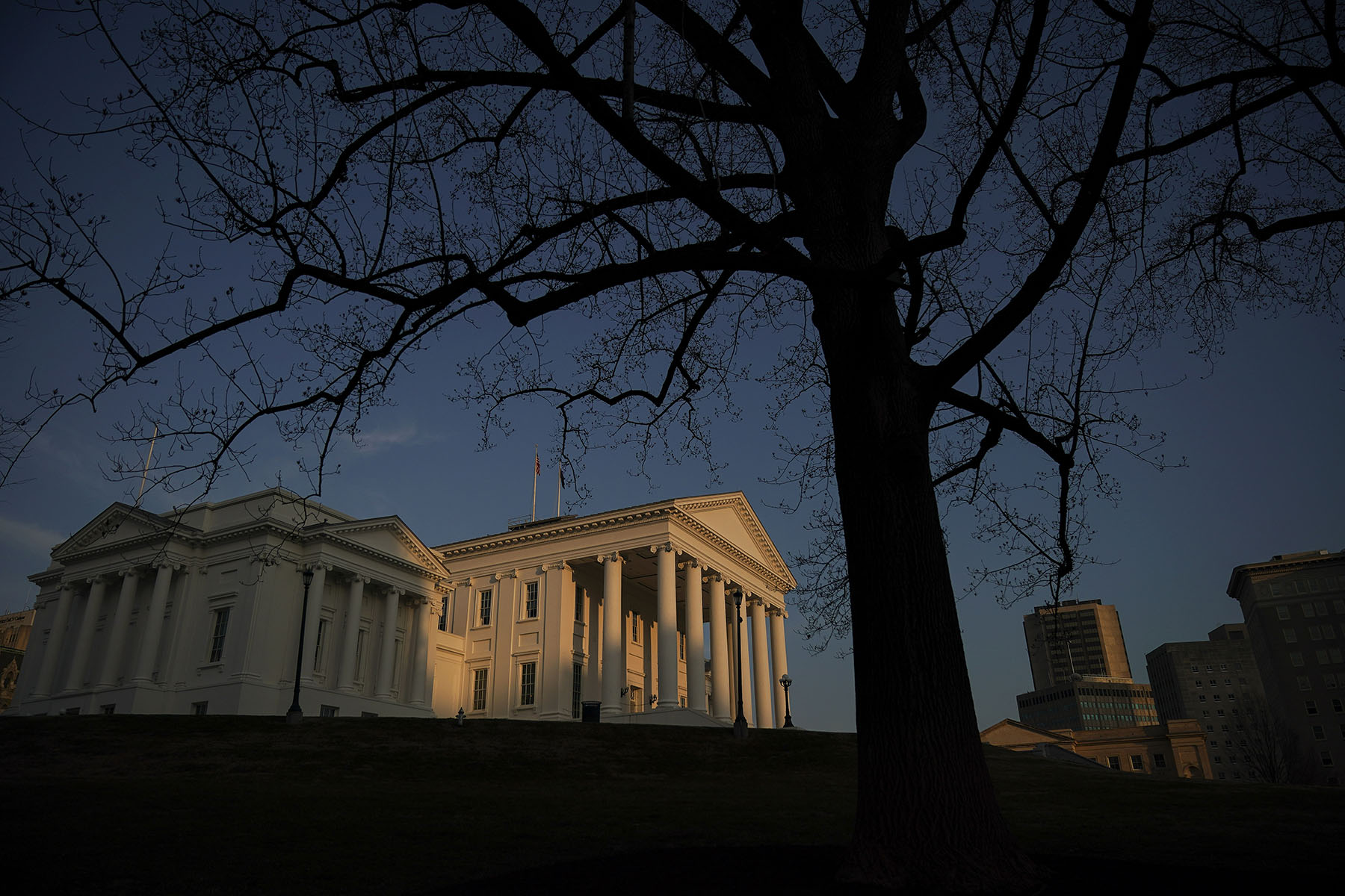 The Virginia State Capitol stands at sunset in Richmond, Virginia.
