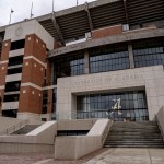 Bryant-Denny Stadium on the campus of The University of Alabama on an overcast day.