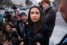 Rep. Alexandria Ocasio-Cortez is interviewed by reporters outside the Capitol.