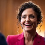 Rep. Julia Letlow smiles as she attends a discussion on Capitol Hill.