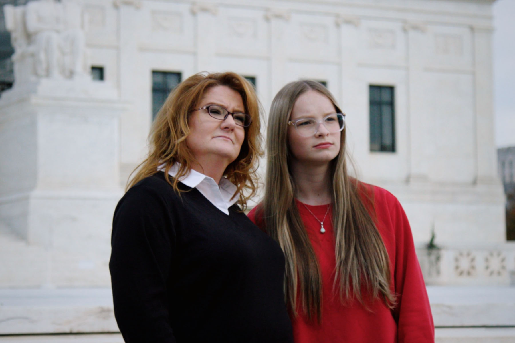 Becky Pepper-Jackson and her mother, Heather Jackson, stand in front of the Supreme Court.