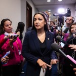 Rep. Alexandria Ocasio-Cortez speaks with reporters on Capitol Hill.