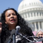 Analilia Mejia speaks during a news conference outside the Capitol.