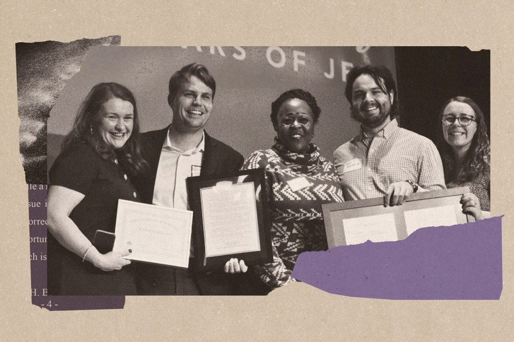 Photo of Nicole Boynton standing with a group of attorneys at an event. Several people hold framed documents or awards while smiling for the camera. A projected backdrop behind them references Justice for Incarcerated Survivors.