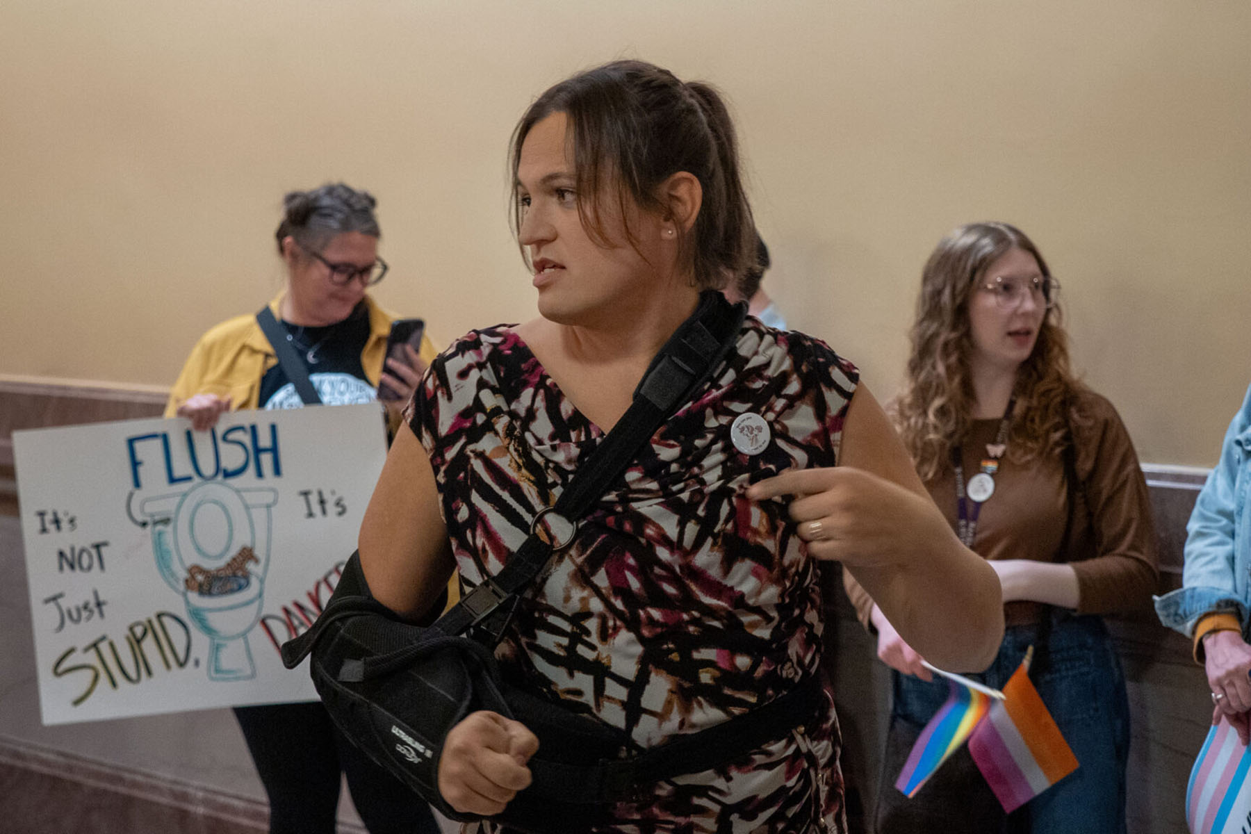 Jaelynn Abegg, a trans rights activist from Wichita, leads a group of around 50 people who used bathrooms throughout the Statehouse.