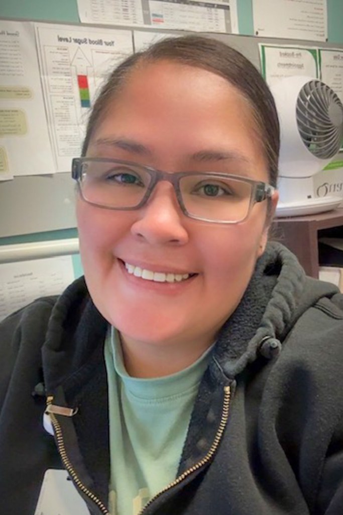 Smiling selfie image of Julie Fontaine.