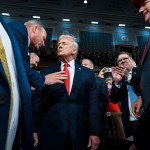 President Donald Trump enters the House Chamber to deliver the State of the Union address at the Capitol.