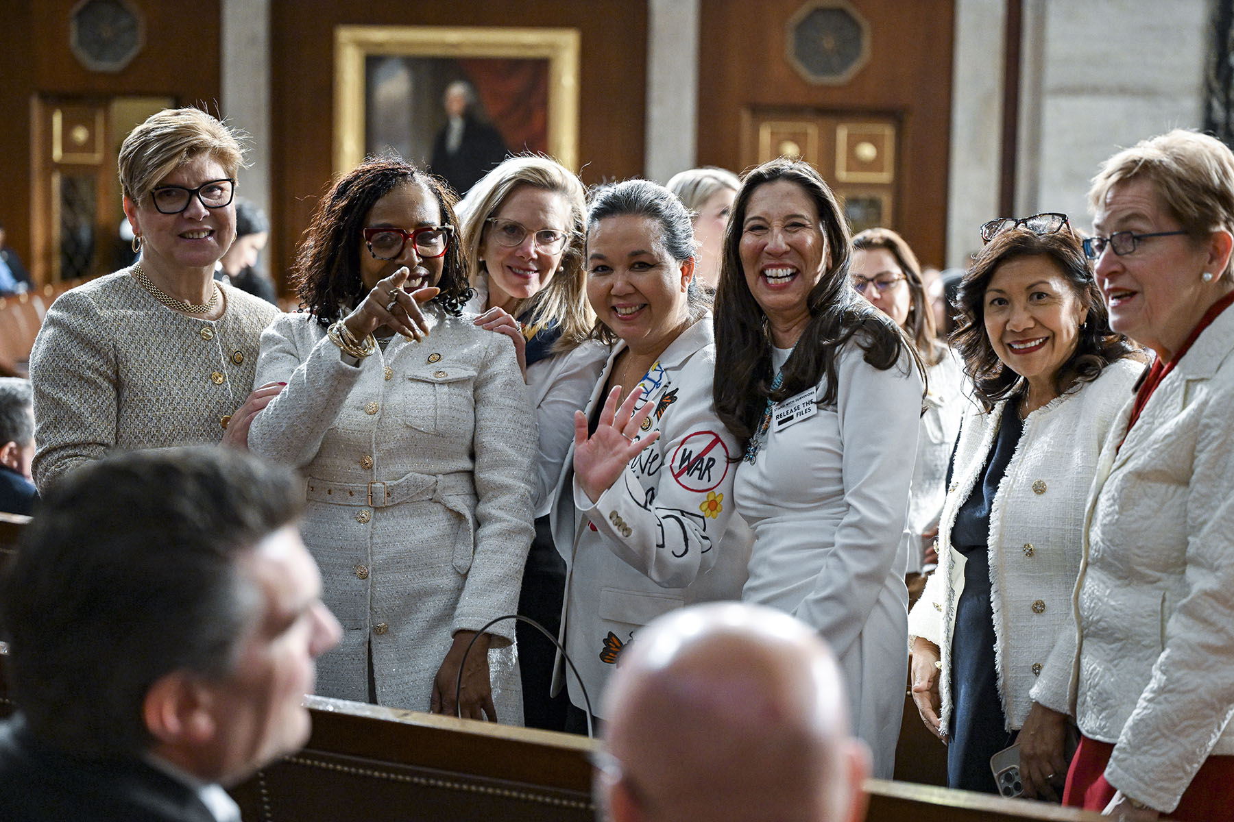 Reps. Nellie Pou, Yvette Clarke, Jill Tokuda, Teresa Leger Fernandez, Norma Torres and Marcy Kaptur look on prior to President Donald Trump's State of the Union address.