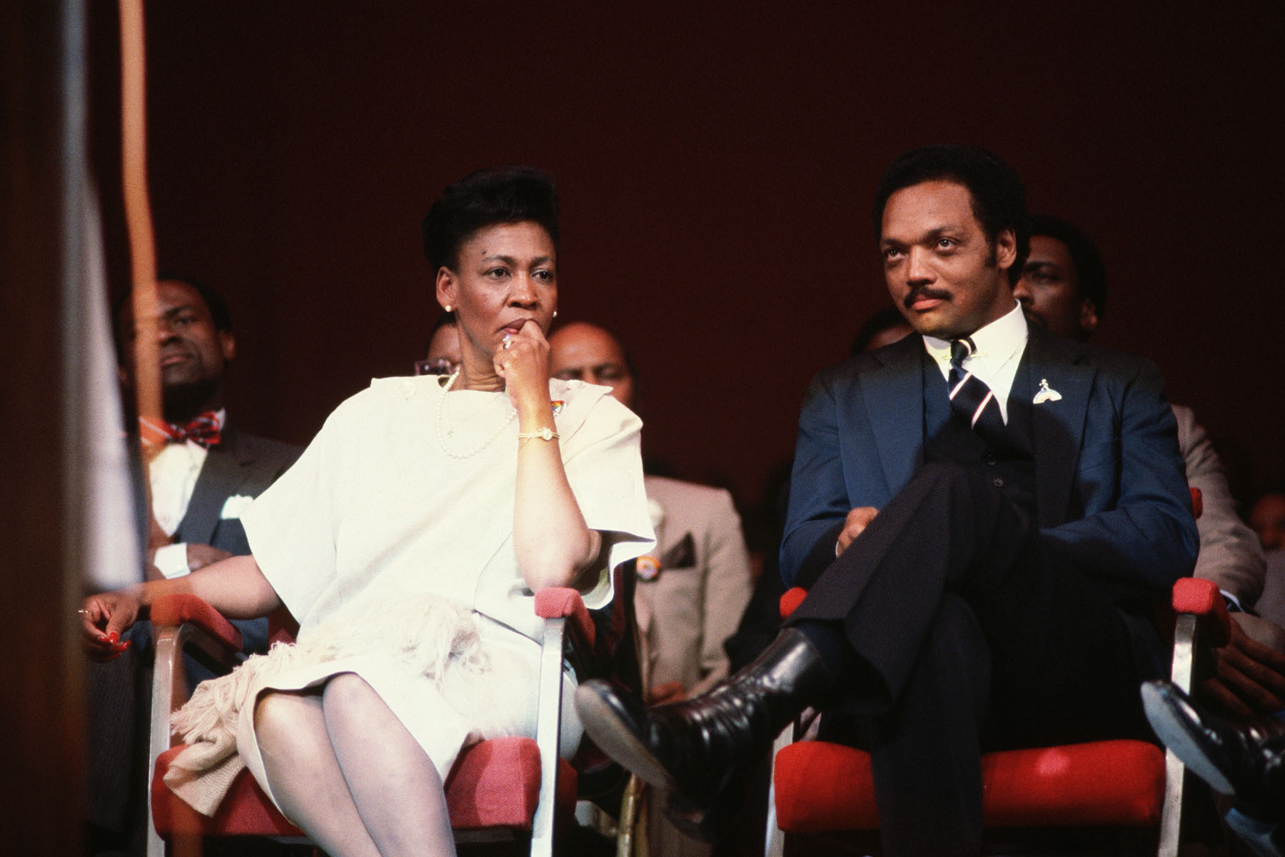 the Rev. Jesse Jackson seated beside Democratic California Congresswoman Maxine Waters at an event in 1984.