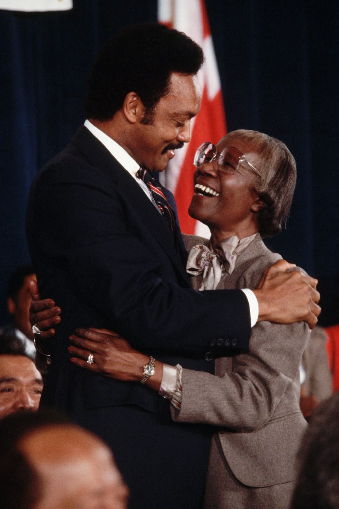 the Rev. Jesse Jackson embracing New York Congresswoman Shirley Chisholm after announcing his candidacy for president in 1983.