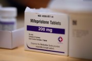 Mifepristone tablets sit on a table at a Planned Parenthood clinic.