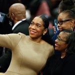 Lt. Gov. Juliana Stratton takes a selfie as she attends a public memorial service to celebrate the life of civil rights activist Reverend Jesse Jackson.
