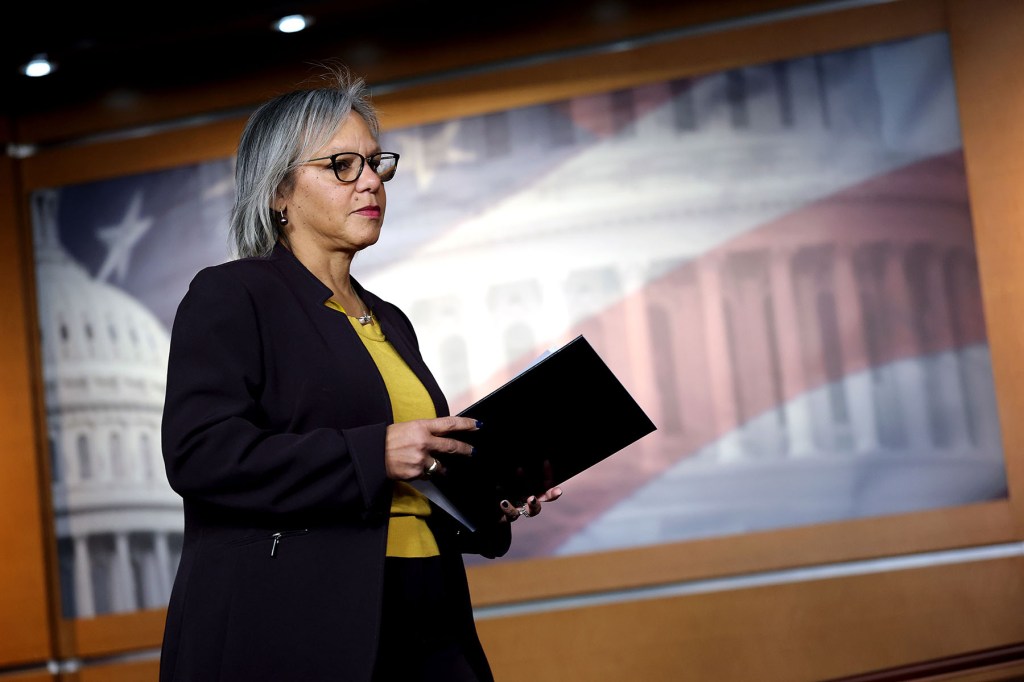 Rep. Robin Kelly arrives for a news conference on Capitol Hill.