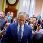 Senate Majority Leader John Thune walks toward the Senate floor at the Capitol Building.