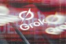 Stylized graphic showing the word “Grok” with a logo over a blurred, glitchy red and black background with streaks and digital distortion effects.